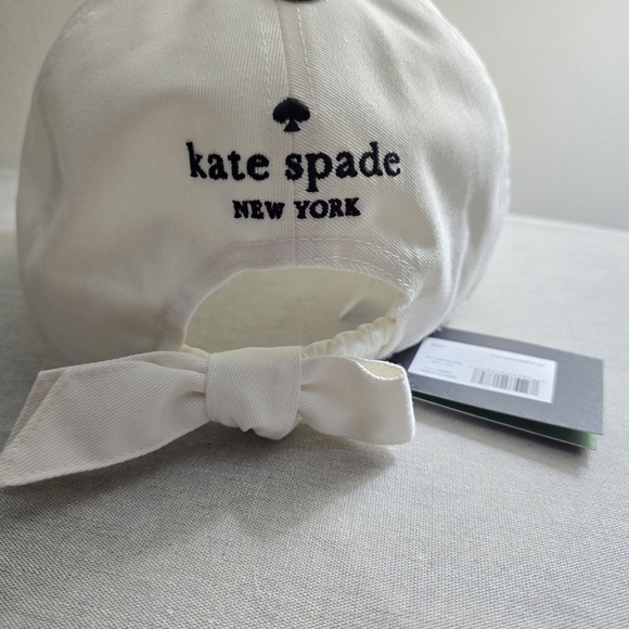 kate spade white baseball cap with gold and pink spade charm main image 13